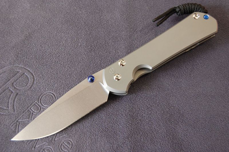 Large Sebenza 31-Plain Right Hand- Drop Point Blade-Glass Blasted-Double Thumb Lug- Blue Hardware. Large Sebenza 31-Plain Right Hand- Drop Point Blade-Glass Blasted-Double Thumb Lug- Blue Hardware.