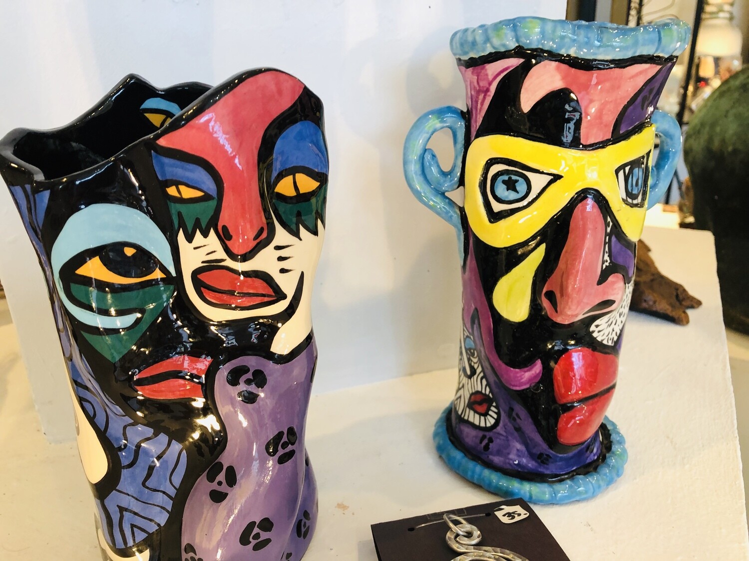 Pagliacci Clown Face Vases formed in clay by Doreen Baskins