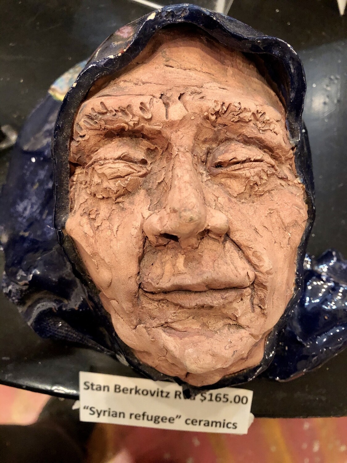 'Old Woman in Shawl Sees the World As Is', by Stan Berkovitz