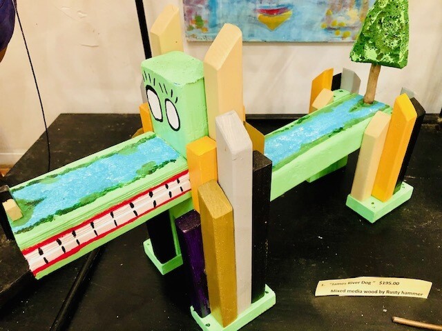 Hand constructed wooden dogs created with

recycled wood strips and painted by Rusty Door of N.C.