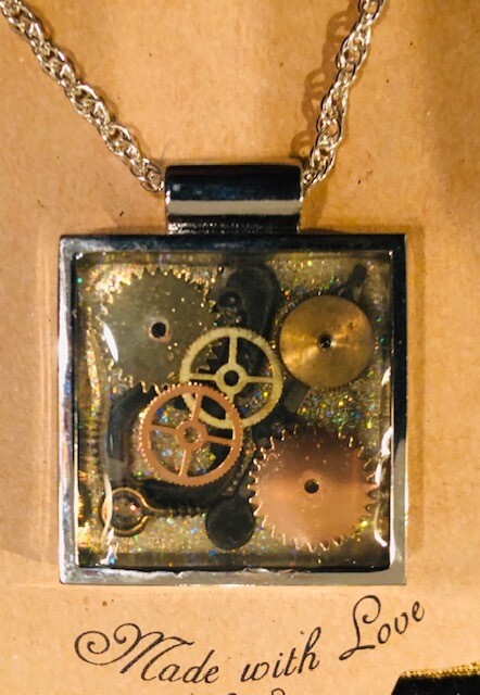 Recycled Clock Parts in resin by Donna Butler Recycled Clock Parts in resin by Donna Butler