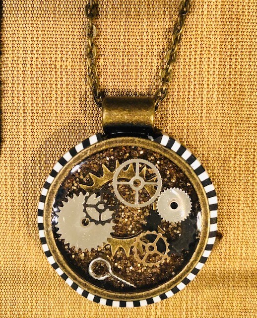 Recycled Clock Parts in resin by Donna Butler Recycled Clock Parts in resin by Donna Butler