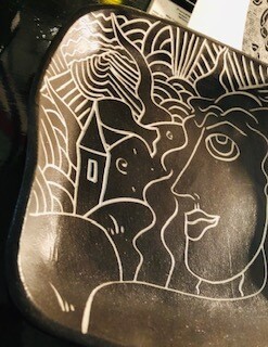 Black Slip Carved in white clay by Mia Tyson