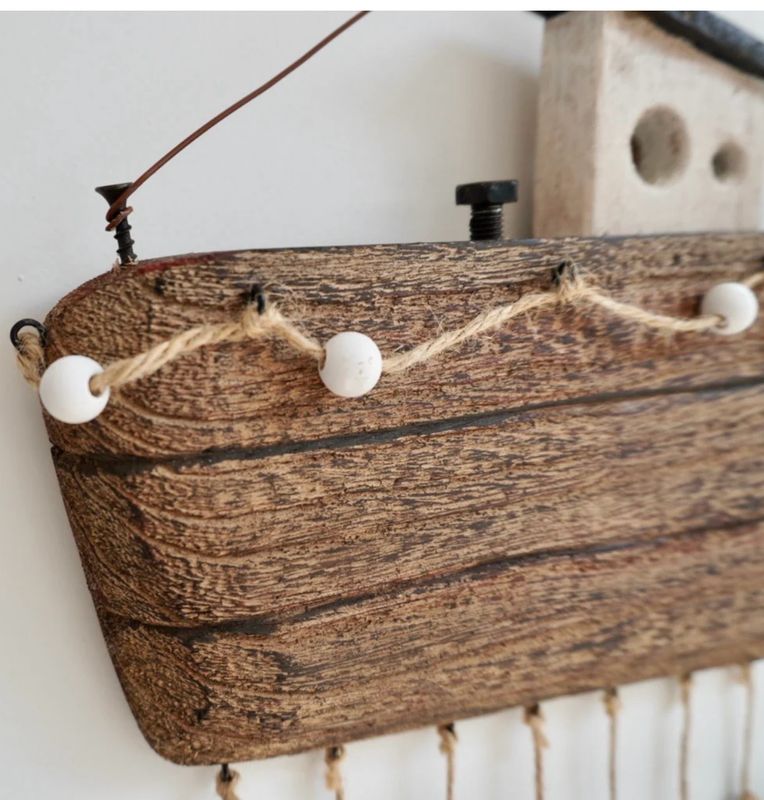 Rustic Trawling Boat With Hanging Fish