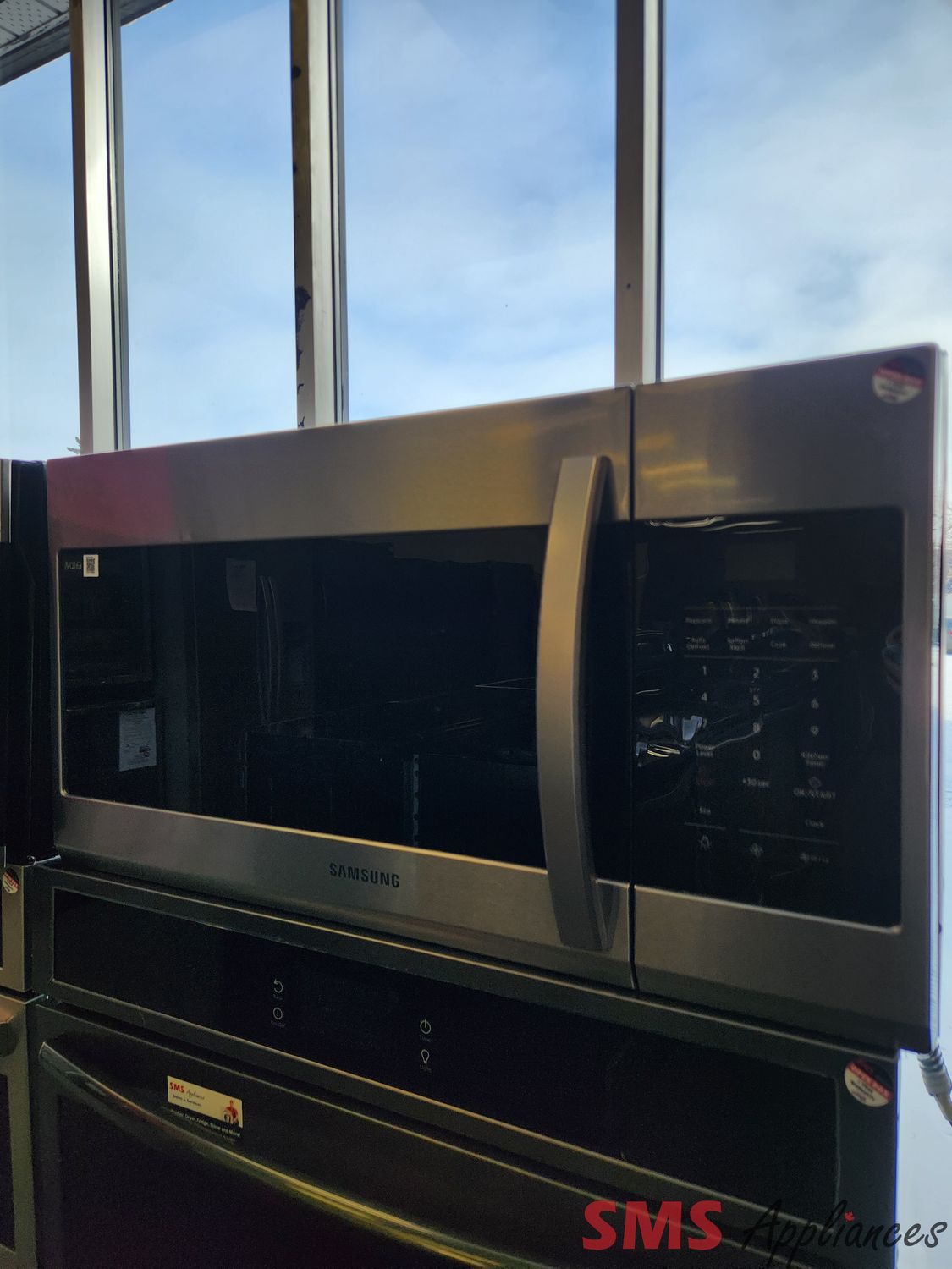 Open Box - Scratch & Dent Samsung Over-the- Range Microwave ME17R7011ES/AC