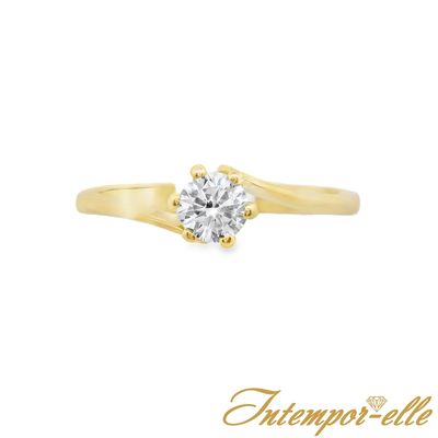 Bague solitaire or 18 carats et zirconium