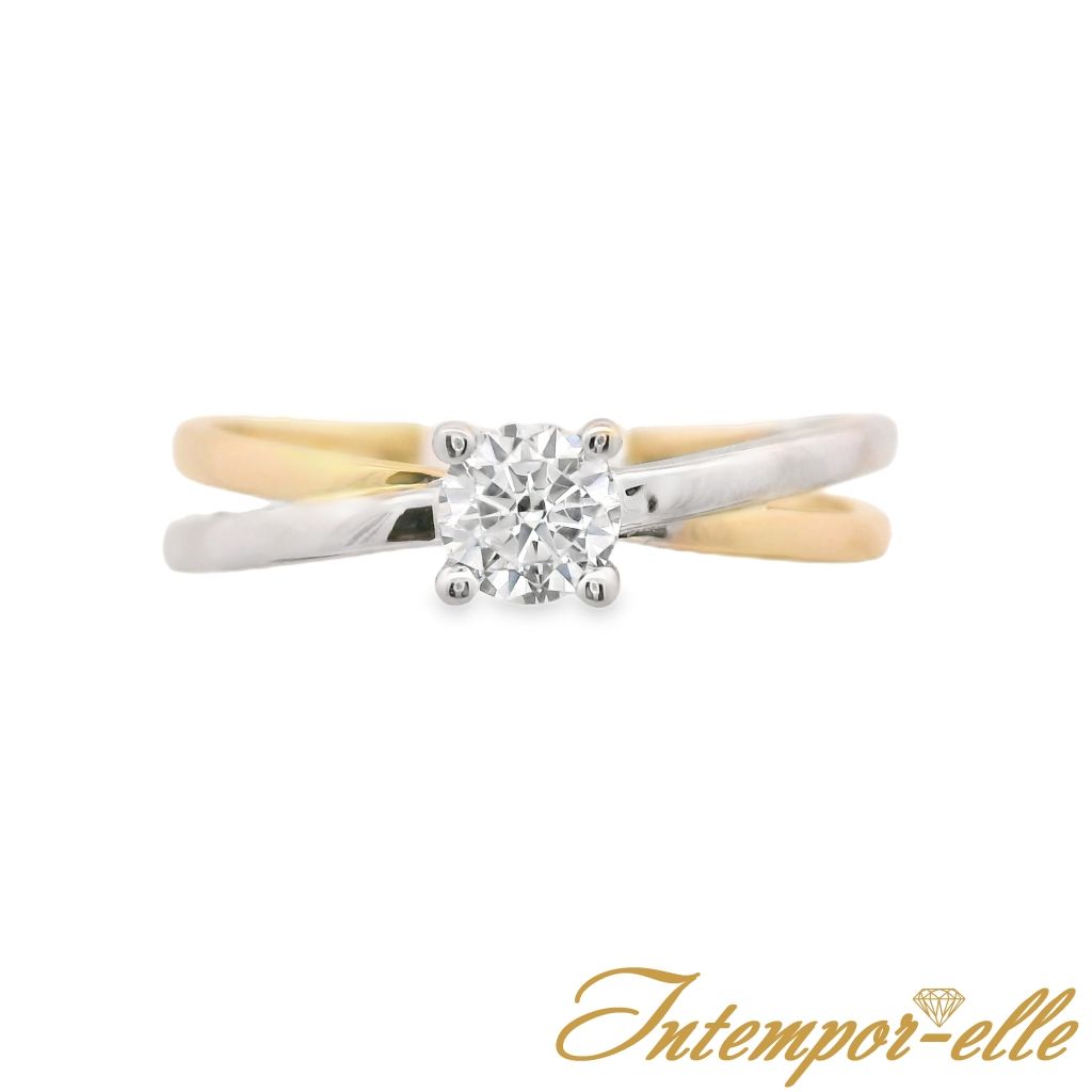 Bague solitaire or 18 carats et zirconium