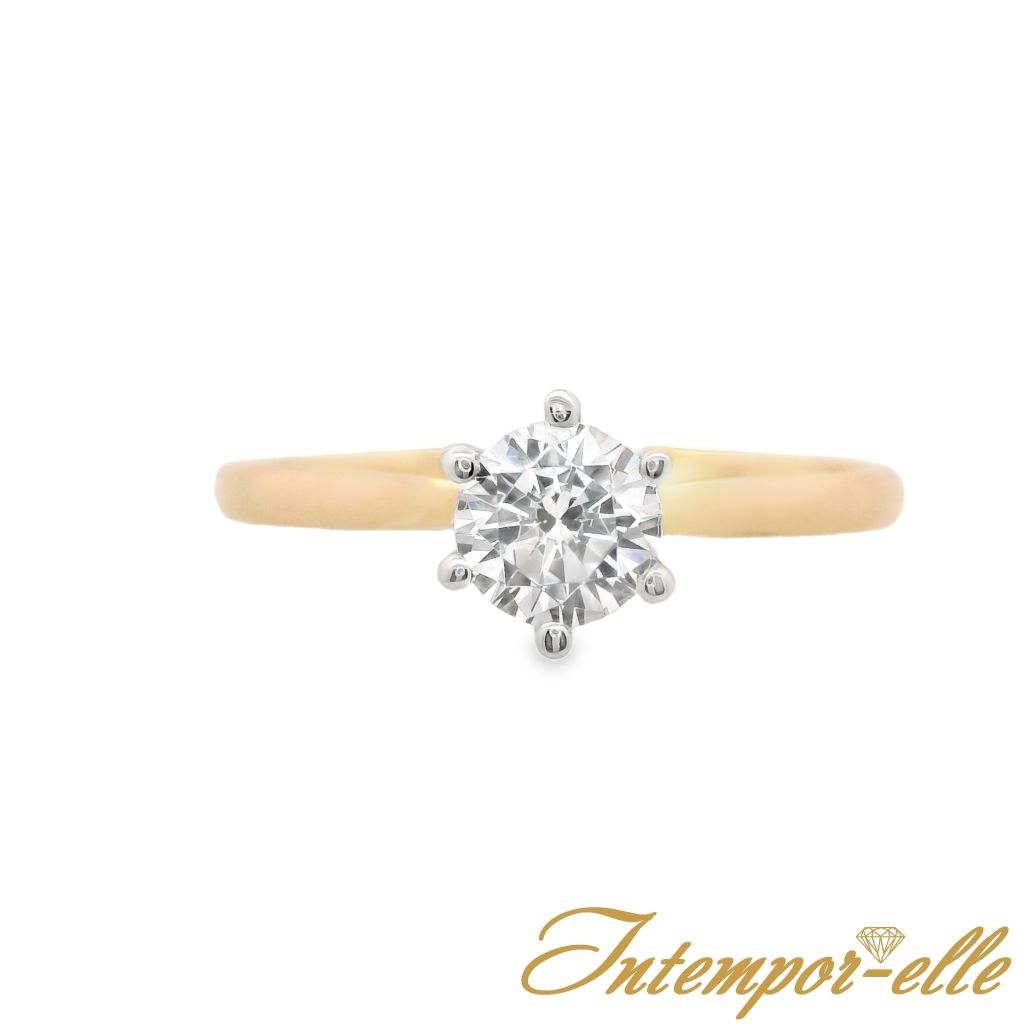 Bague solitaire or 18 carats et zirconium