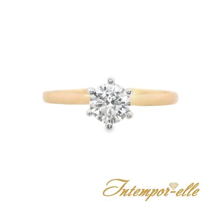 Bague solitaire or 18 carats et zirconium