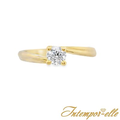 Bague solitaire or 18 carats et zirconium