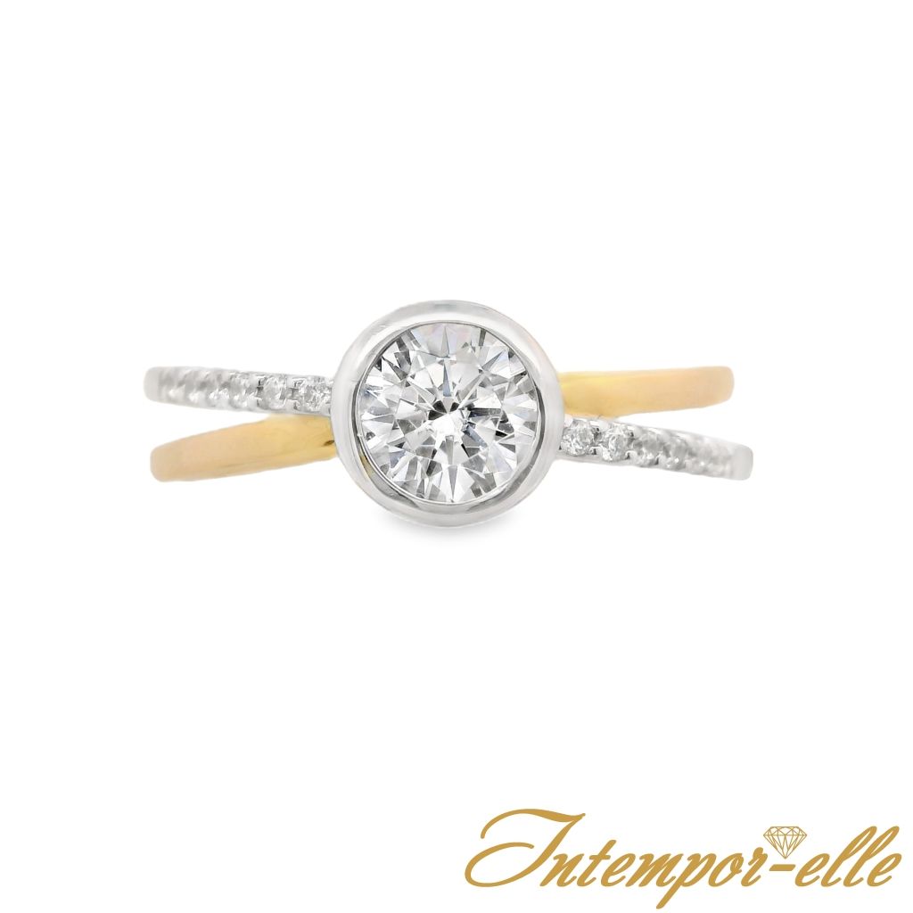 Bague solitaire or 18 carats et zirconium