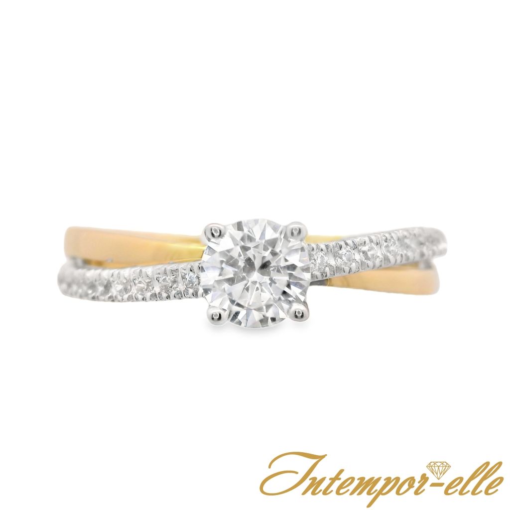 Bague solitaire or 18 carats et zirconium