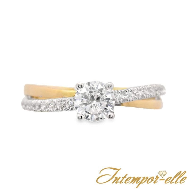 Bague solitaire or 18 carats et zirconium