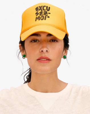 Clare V. Trucker Hat in Excusez Moi Marigold