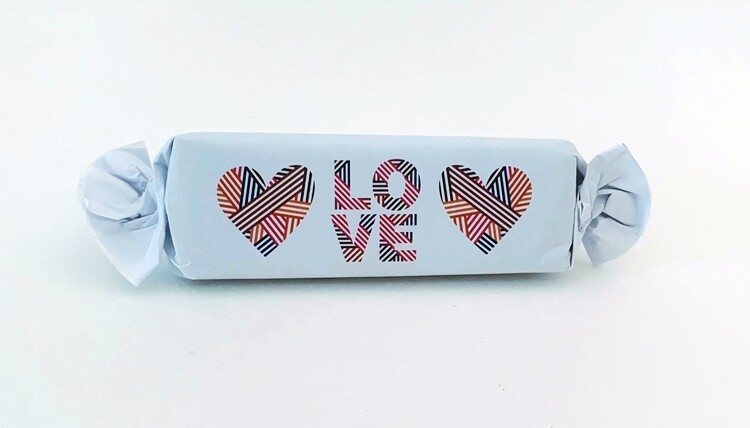Assorted Flavour Caramel Toffee  in a modern Love themed wrapper.