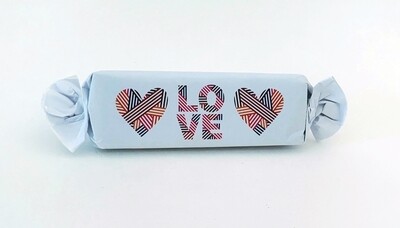 Assorted Flavour Caramel Toffee  in a modern Love themed wrapper.