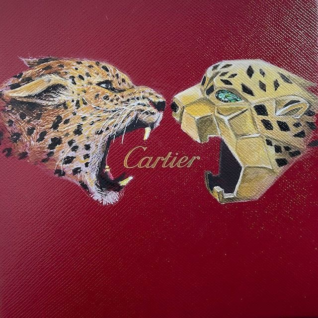 Fight of the Cartier Cats