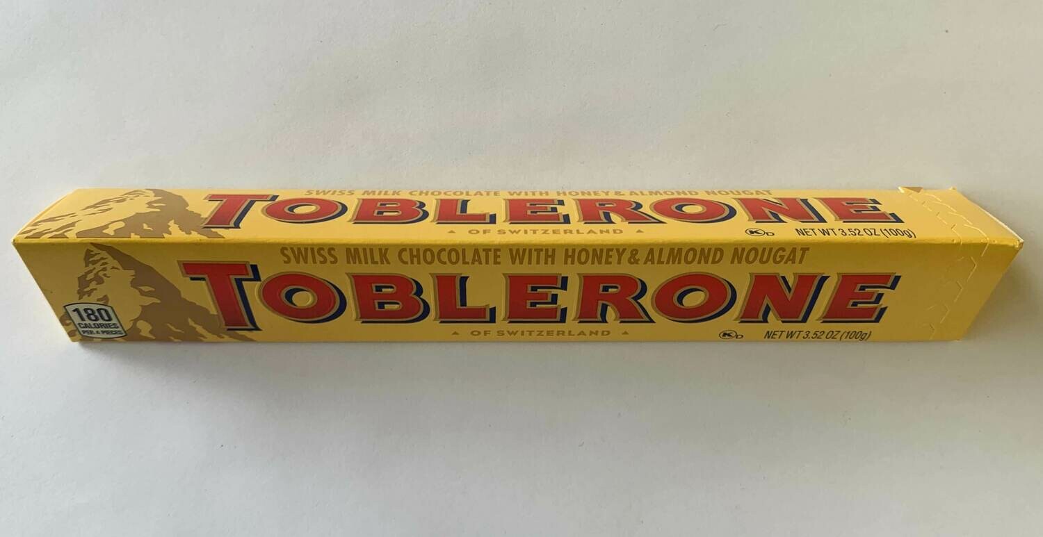 Toblerone Swiss Milk Chocolate Honey & Almond Nougat Bar Toblerone Swiss Milk Chocolate Honey & Almond Nougat Bar