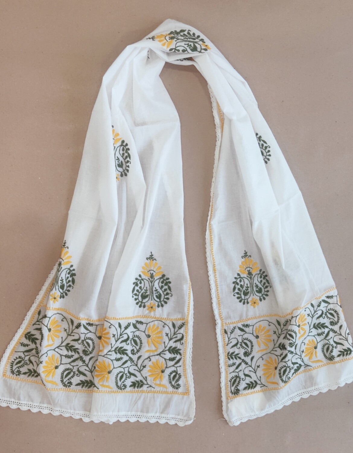 White stole with yellow and green embroidery