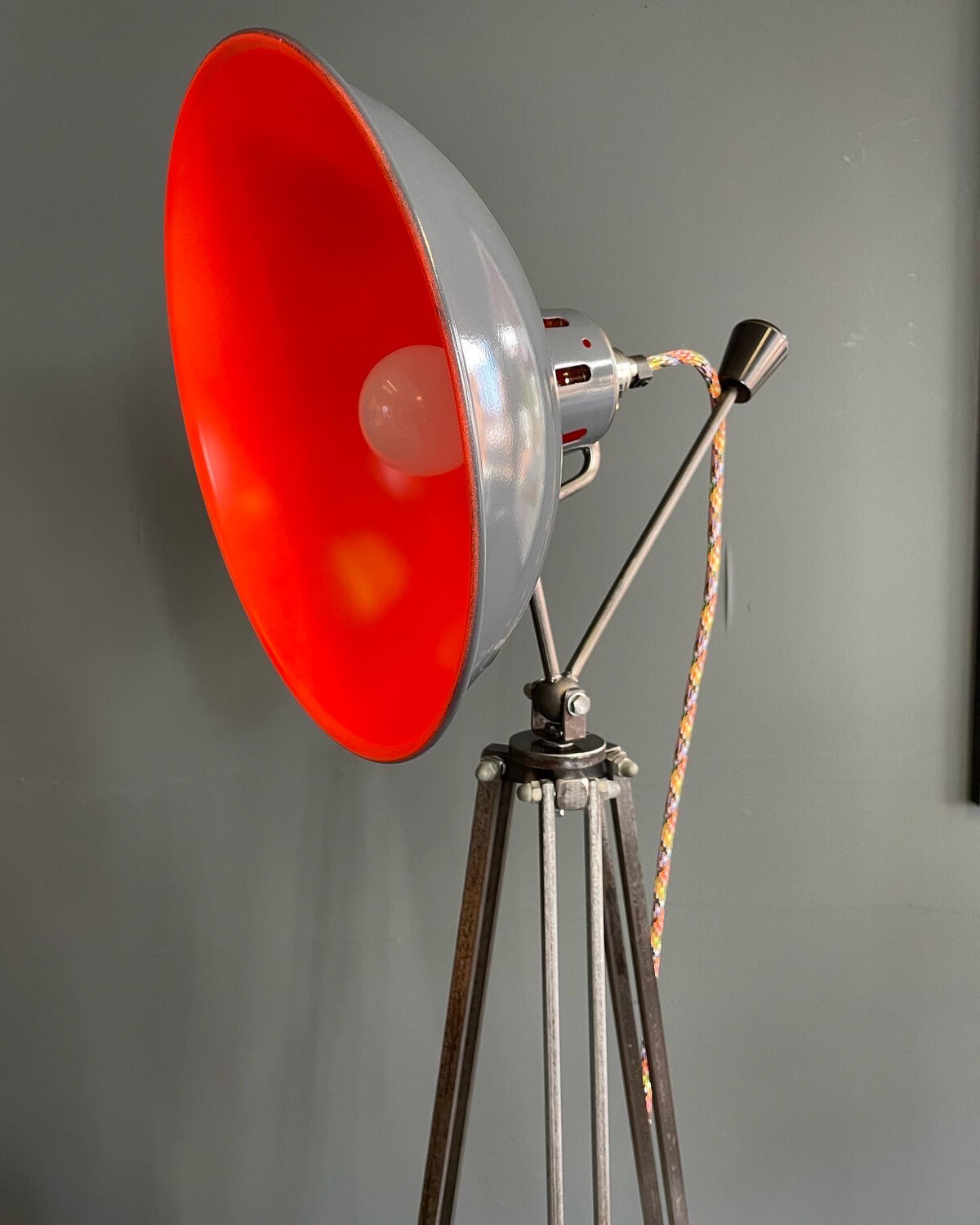 Grey And Neon Orange Industrial Tripod Lamp