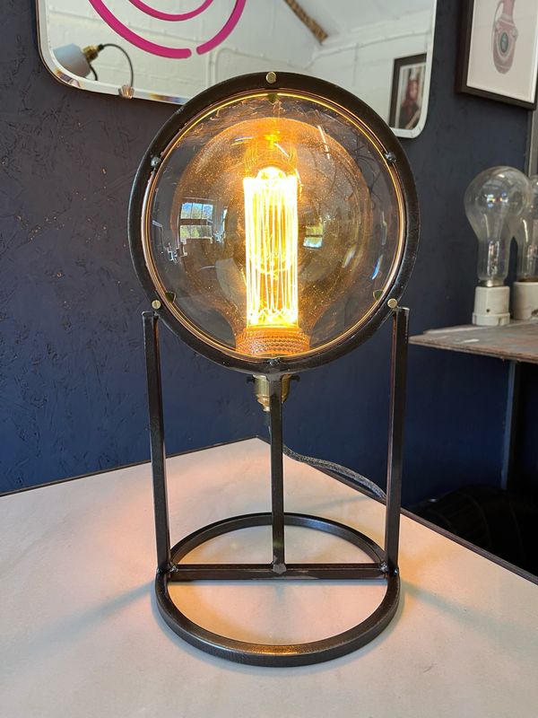 Reclaimed Lens On Bespoke Steel Lamp Stand