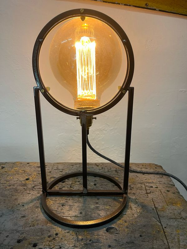 Reclaimed Lens On Bespoke Steel Lamp Stand