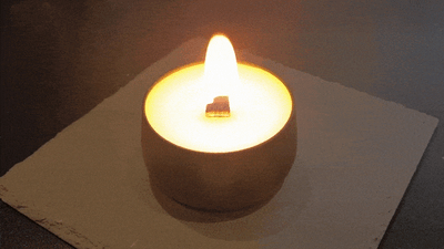 Holzdochtkerze mit Runenkette 260g