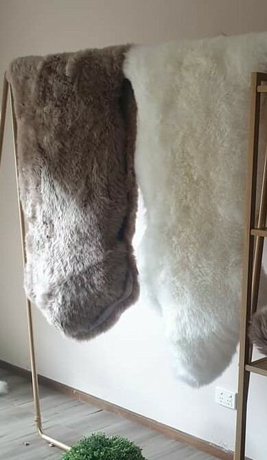 Double Sheepskin Rug (Two Pelts) Featured photo in Brown Tea and Sky White. Available in other colours.