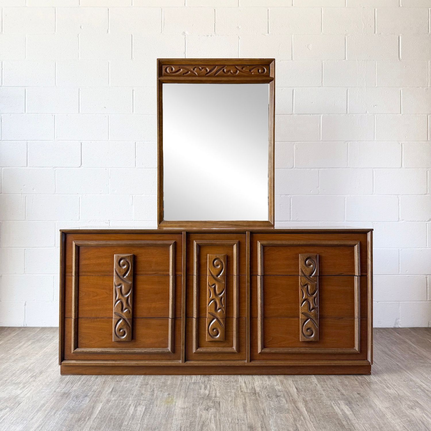 Vintage Mid-Century Modern Bassett Mayan Walnut 9-Drawer Lowboy and Mirror
