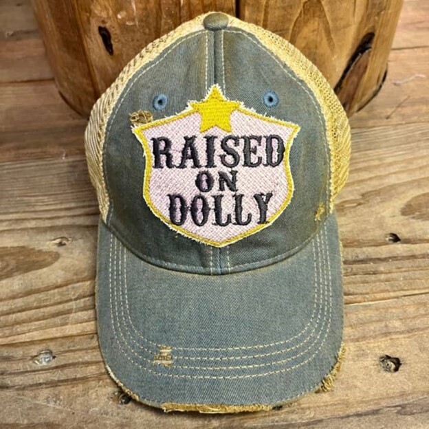 Raised on Dolly Distressed Trucker Cap