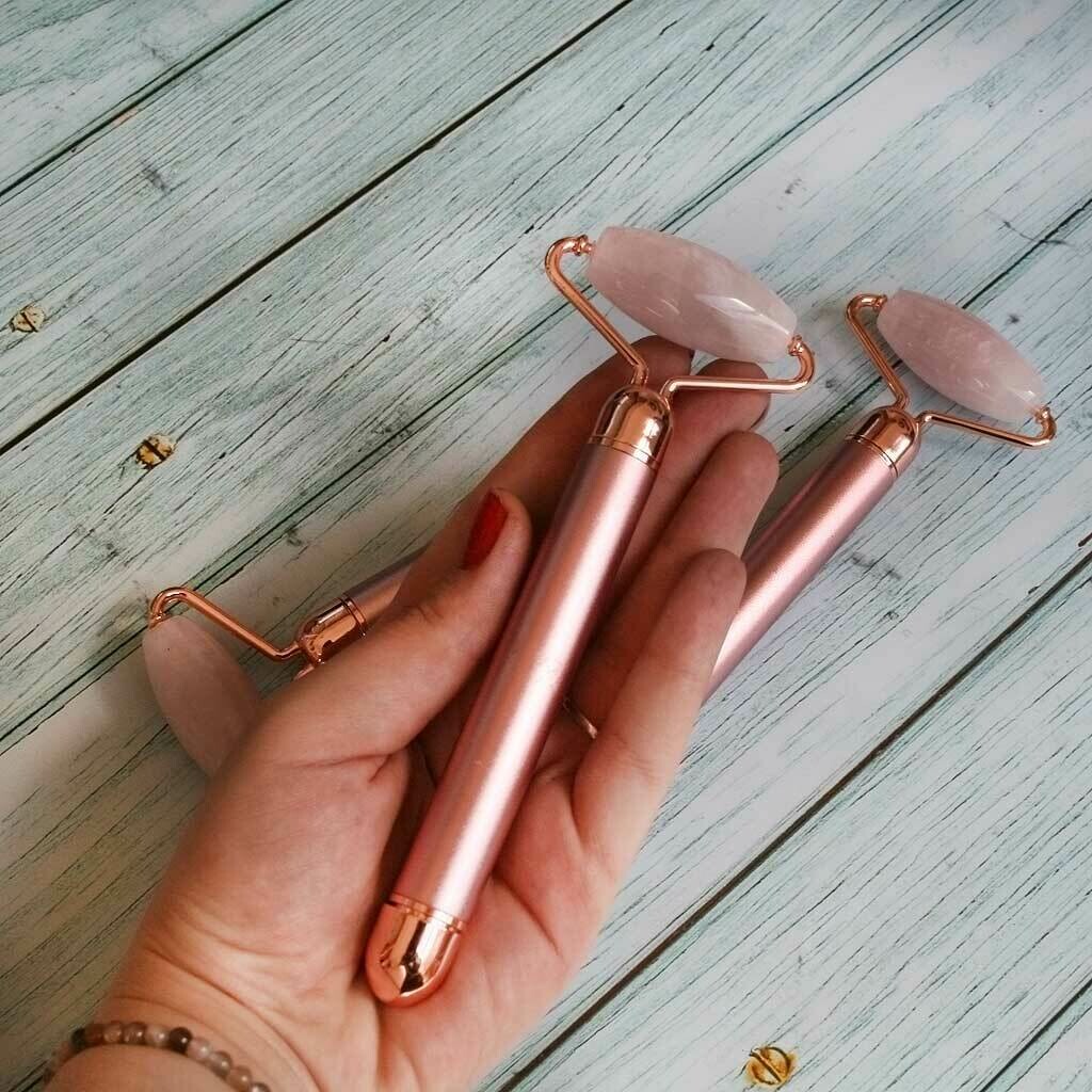 Masajeador iónico con vibración de cuarzo rosa