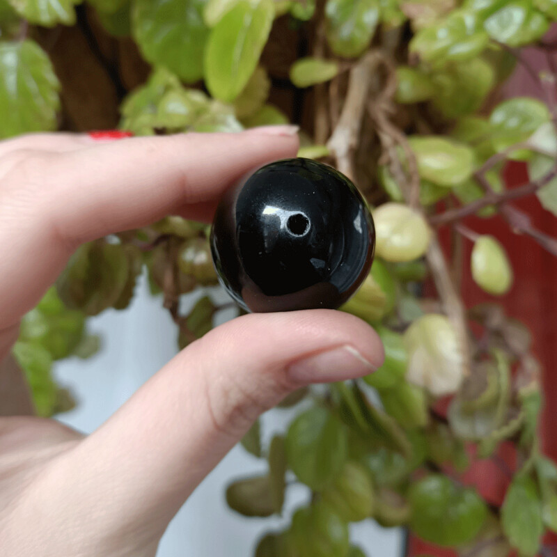 Huevo yoni de Obsidiana negra agujereado