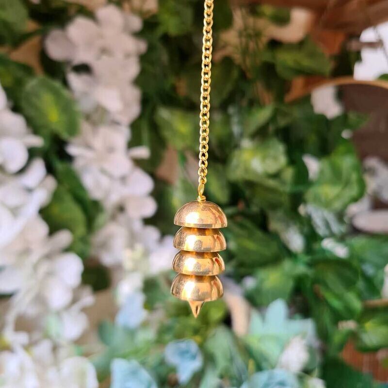 Péndulo Osiris de bronce con testigo