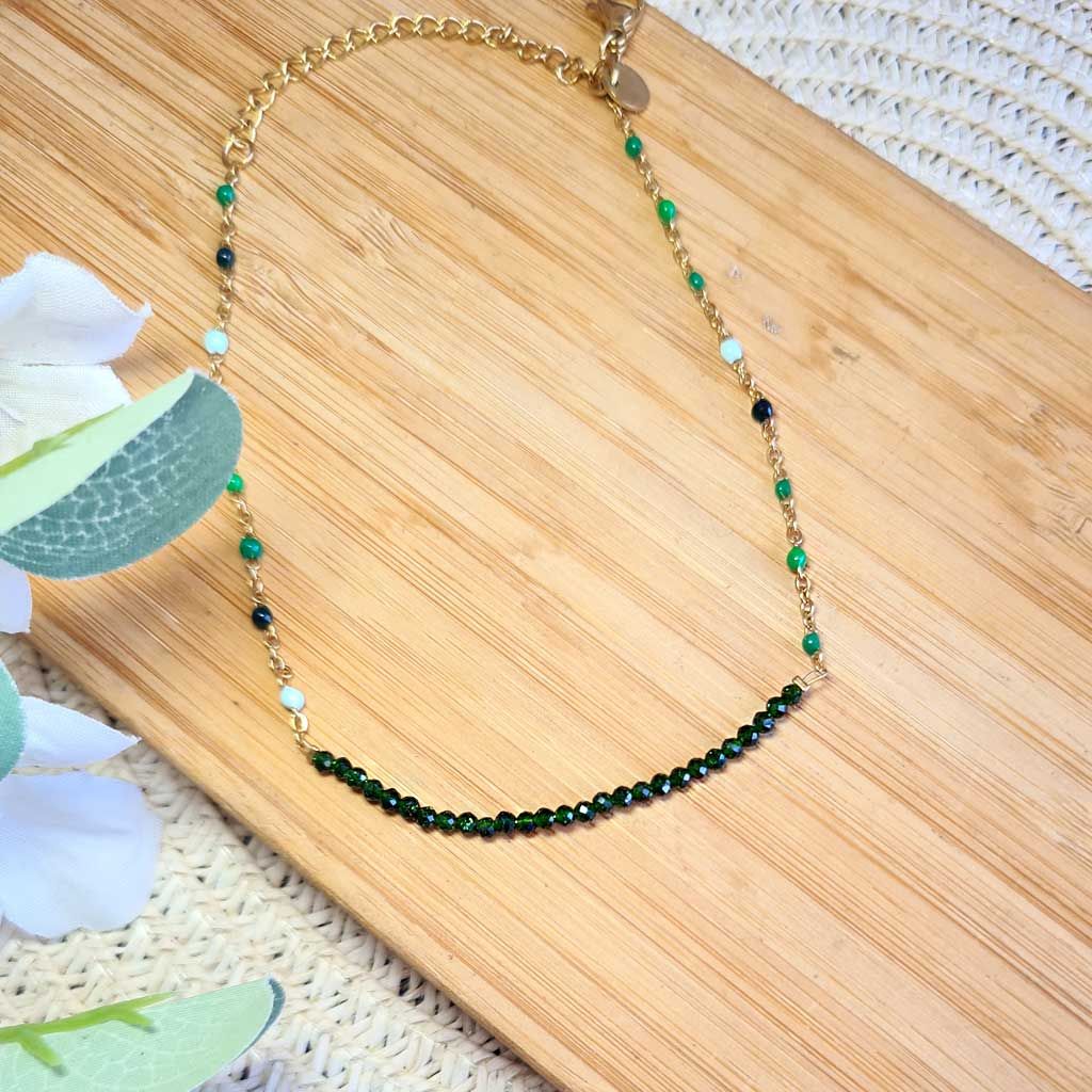 Tobillera de Esmeralda en acero dorado.