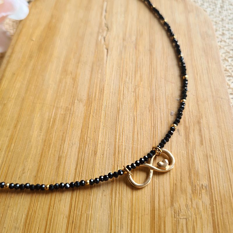 Gargantilla de Espinell y Infinito en acero dorado