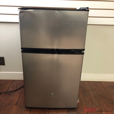 Open Box - Scratch and Dent GE 3.1 Cu.Ft Double Door Compact Refrigerator GDE03GLKLB