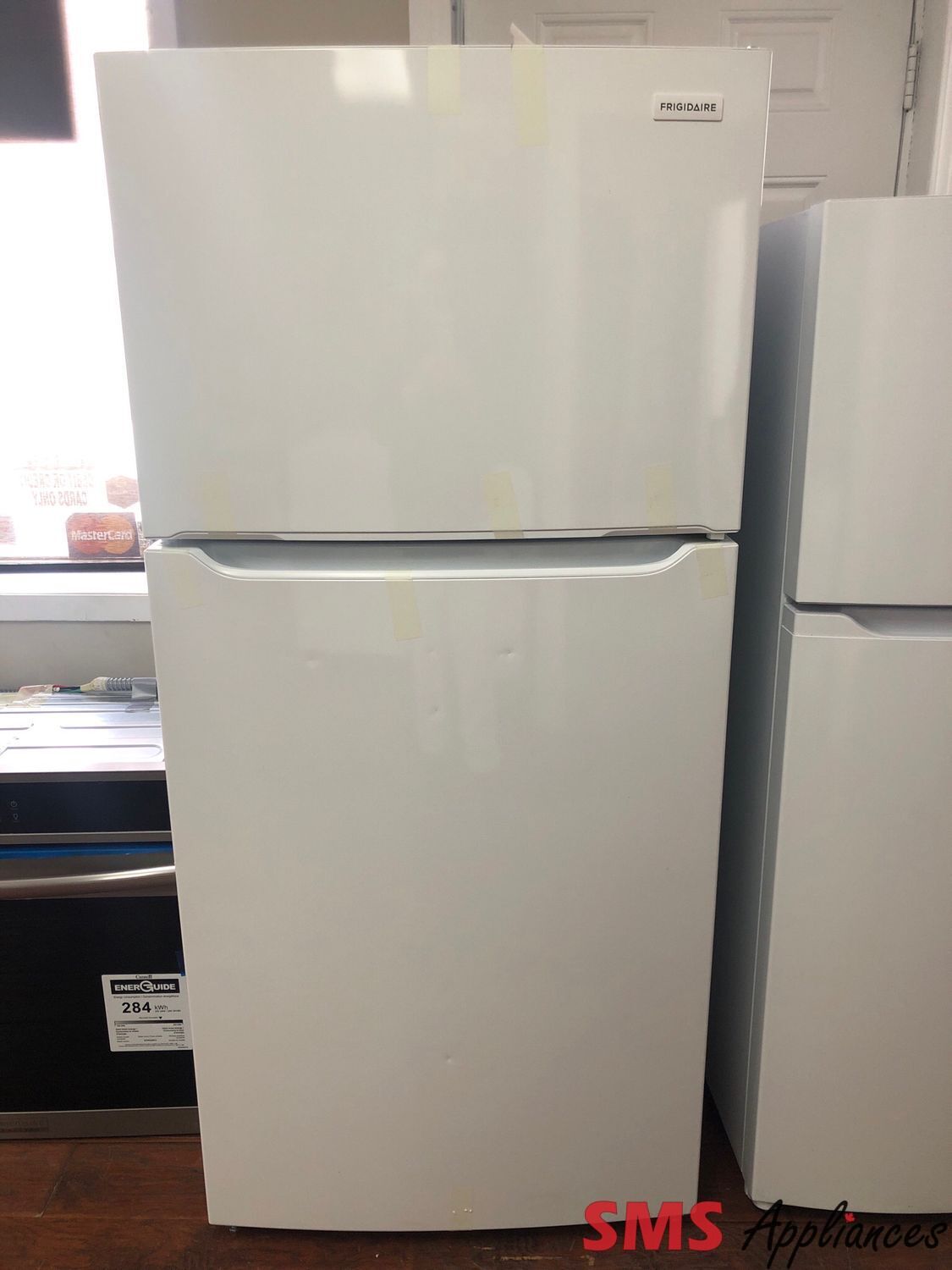 Open Box-Scratch and Dent Frigidaire 30” Top Freezer Refrigerator FFTR2045VW