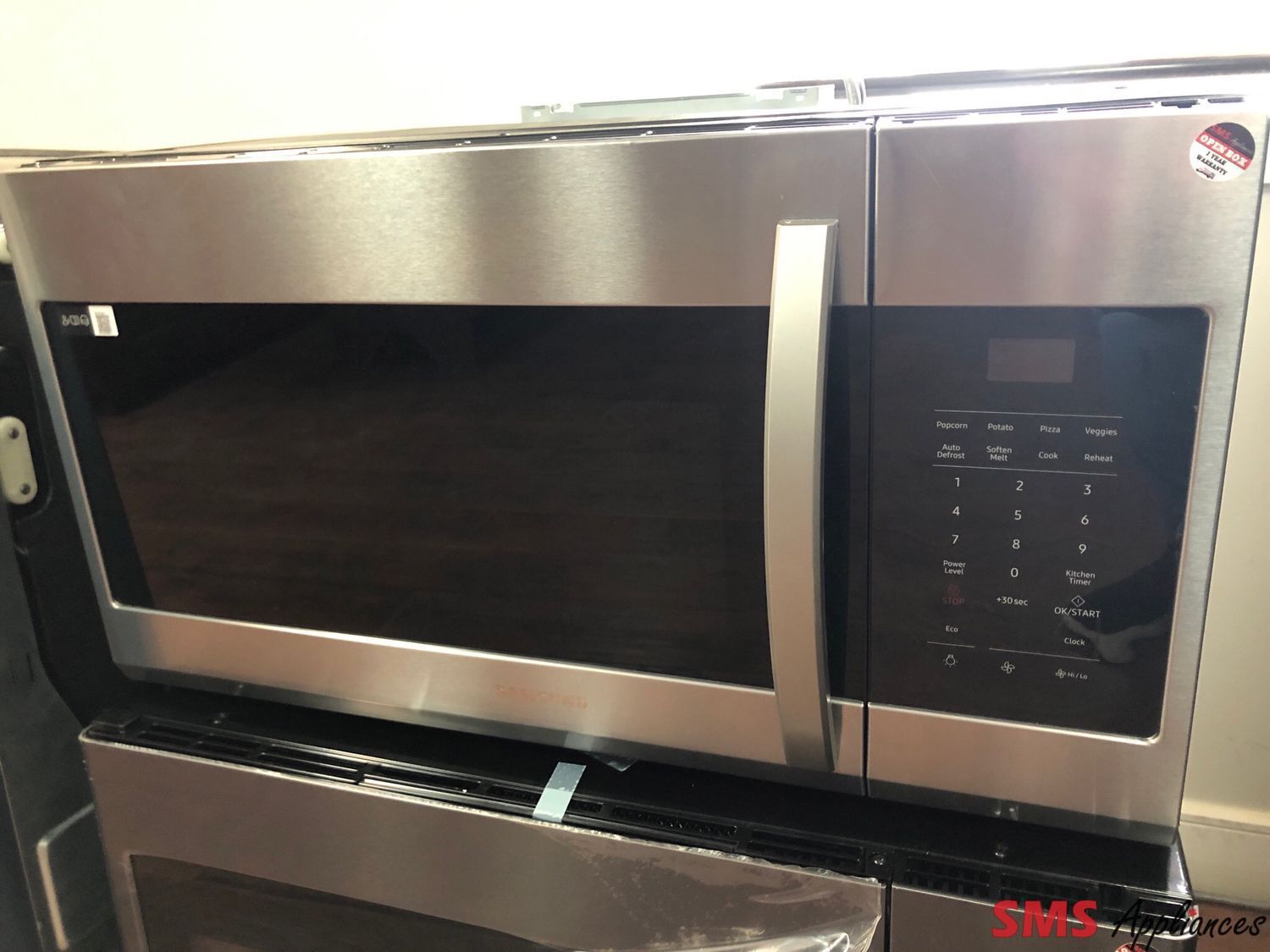 Open Box-Scratch and Dent Samsung Over-the-Range Microwave ME17R7011ES/AC