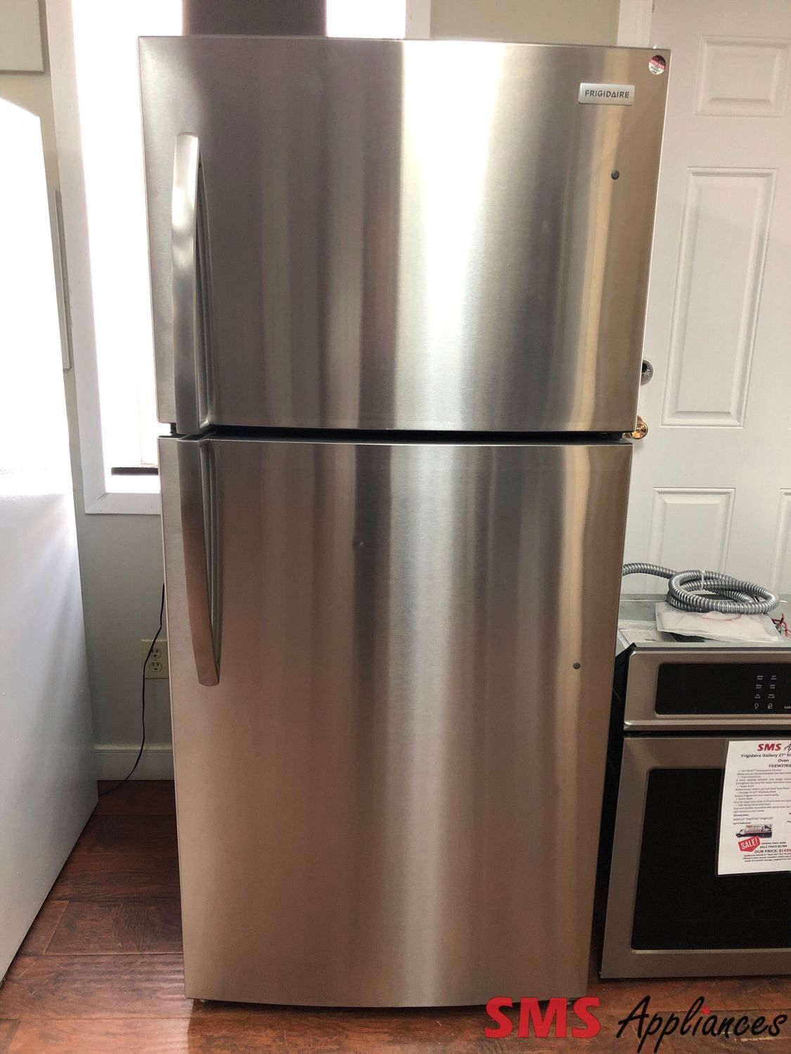 Open Box Scratch and Dent Frigidaire 30” Top-Mount Refrigerator FFHT2022AS