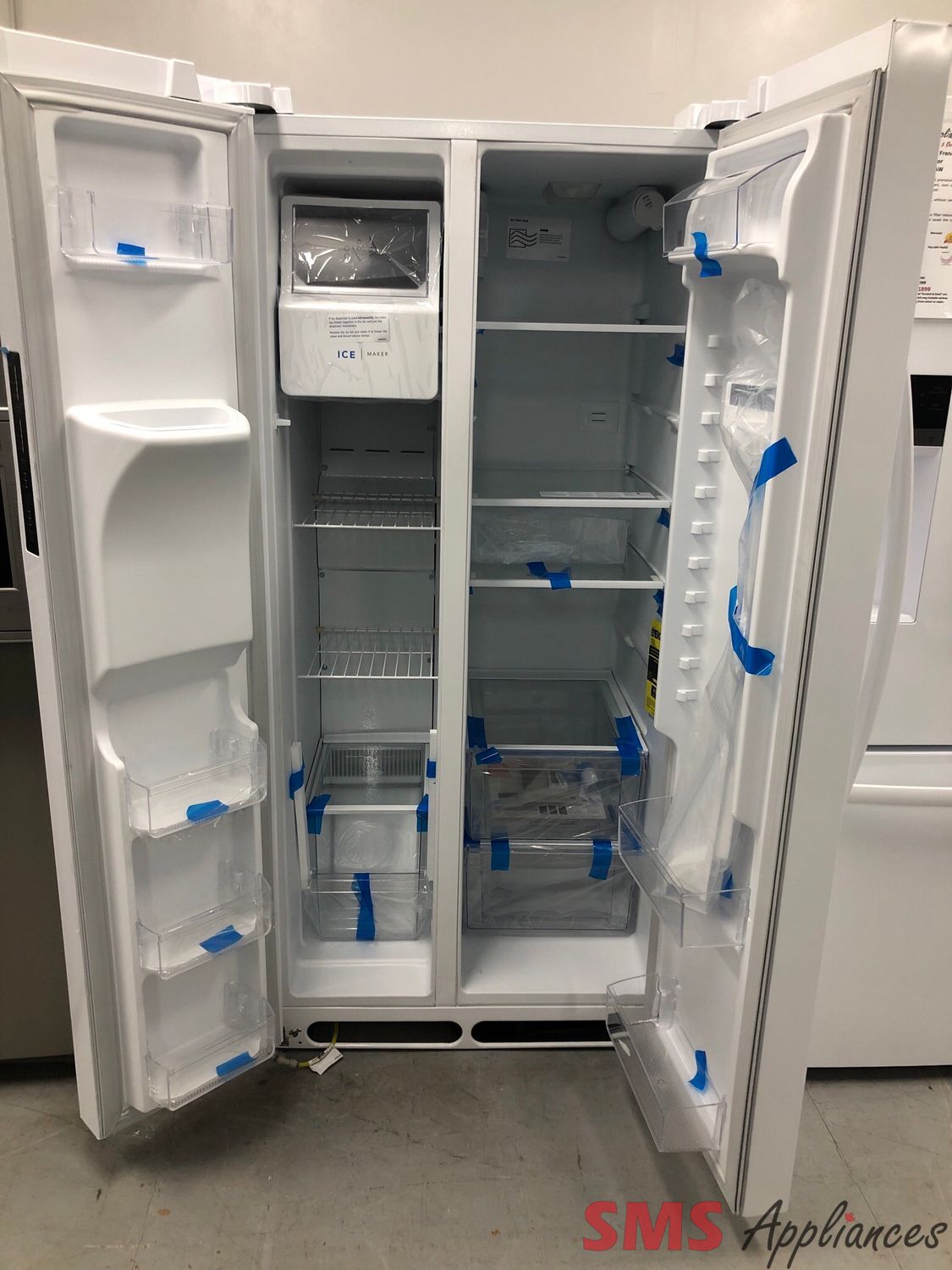 Open Box -Scratch and Dent Frigidaire 33” Side By Side Refrigerator FRSS2323AW