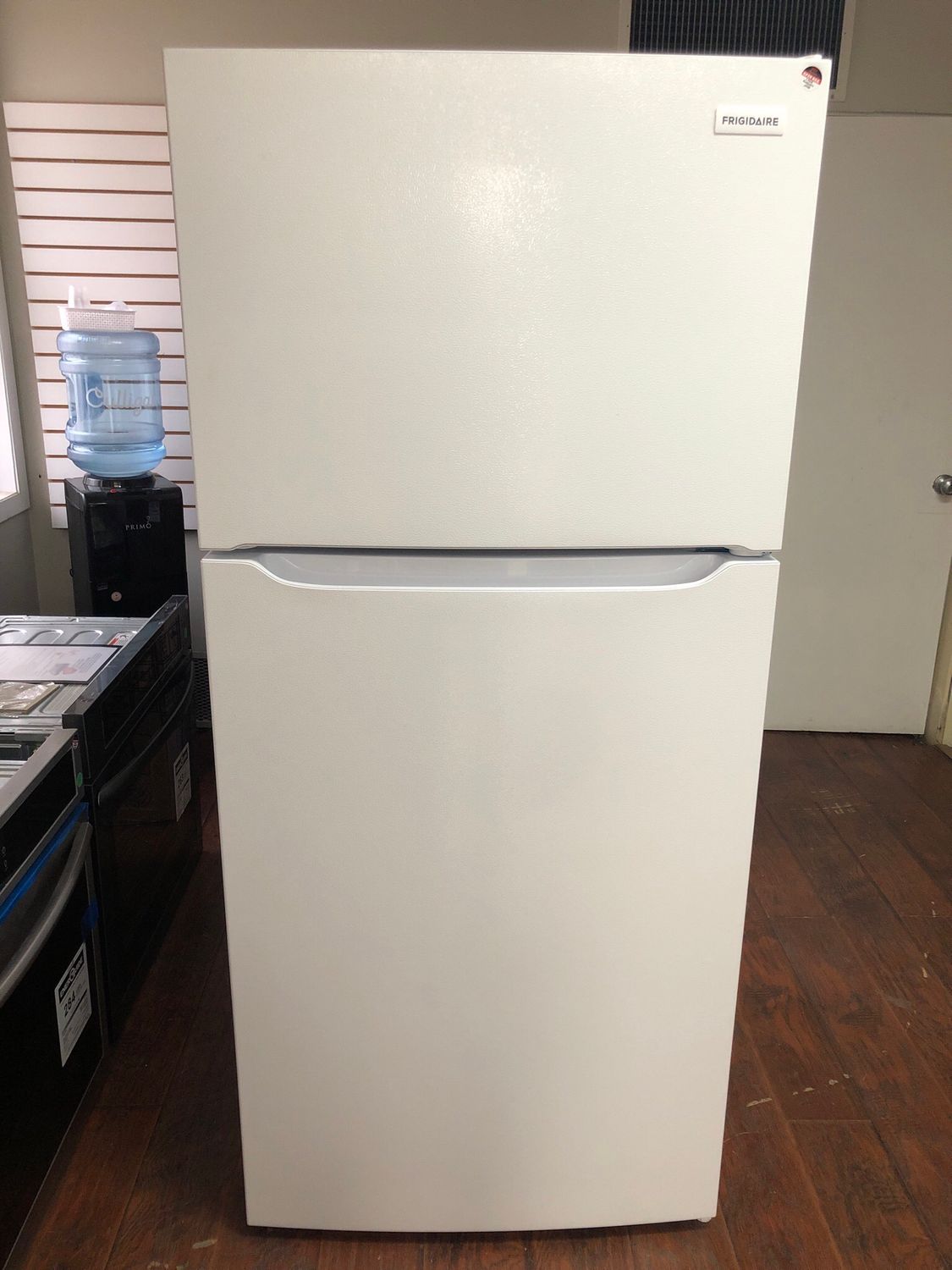 Open Box-Scratch and Dent Frigidaire 30'' Top Freezer Refrigerator FFHT1814YW