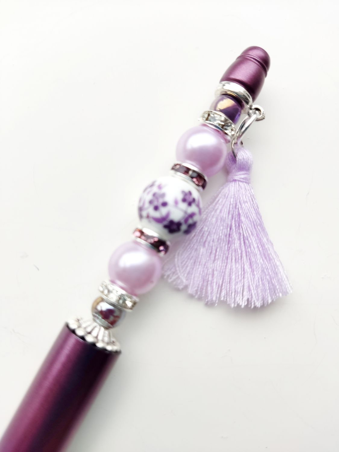 Kralenpen DIY pakketje donkerpaars gebloemde kraal met lila kwastje