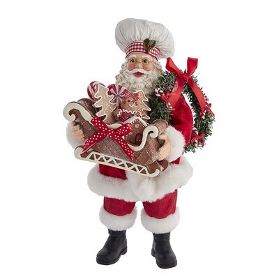 Fabriche Chef Santa Holding Gingerbread Sled And Wreath.