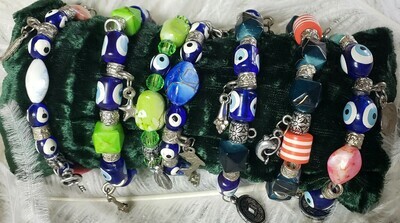Charm Bracelets w/evil eye
