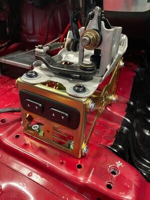 Gear shift riser bracket