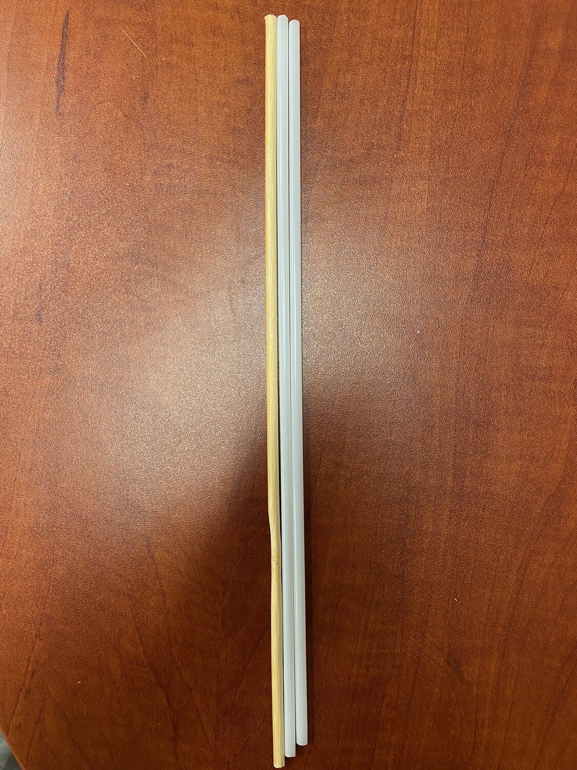 A safety rod and two plastic straws