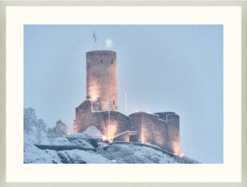Framed photograph of the Tour de la Bâtiaz under snow