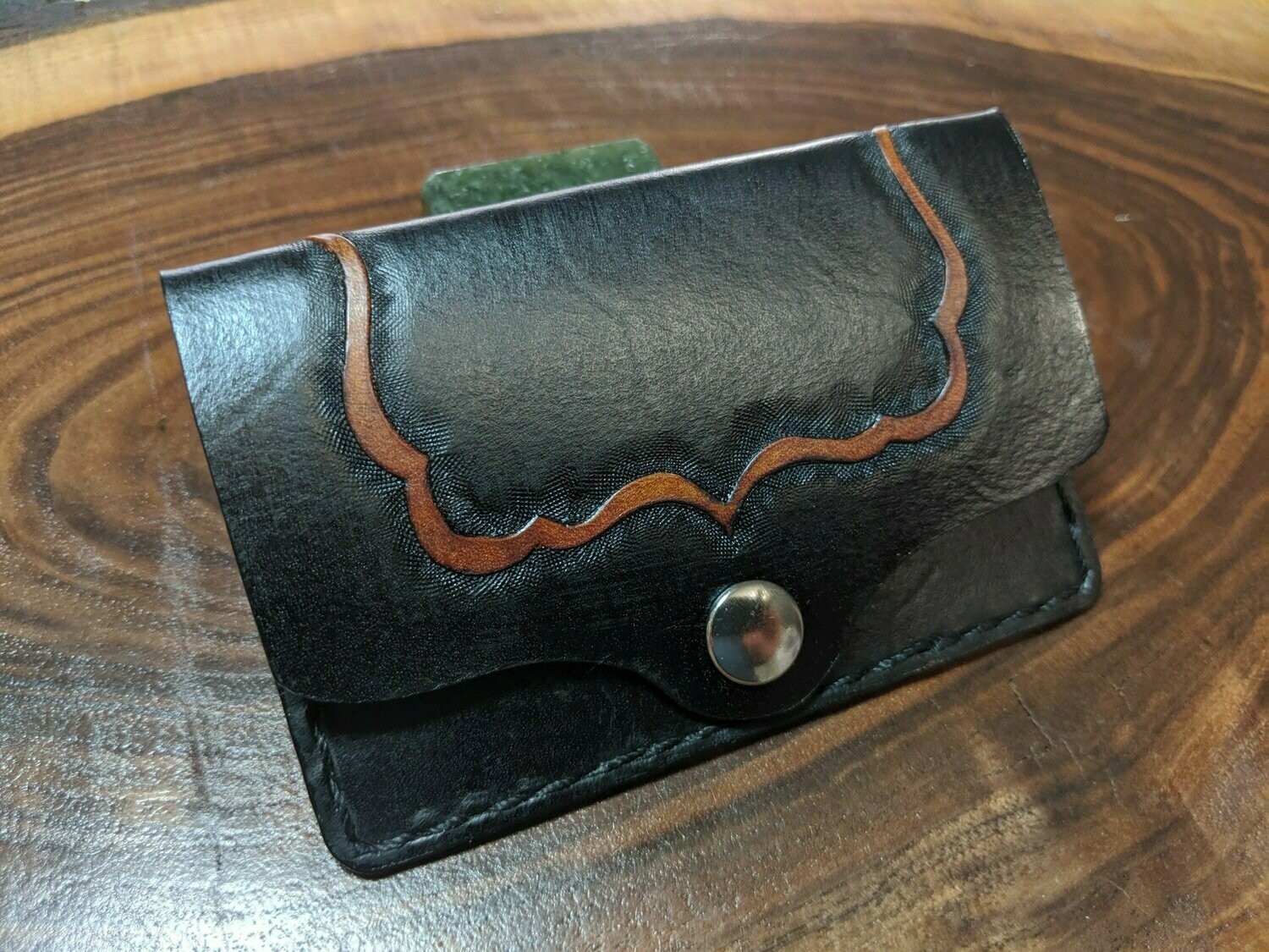 Black business card wallet with brown accent