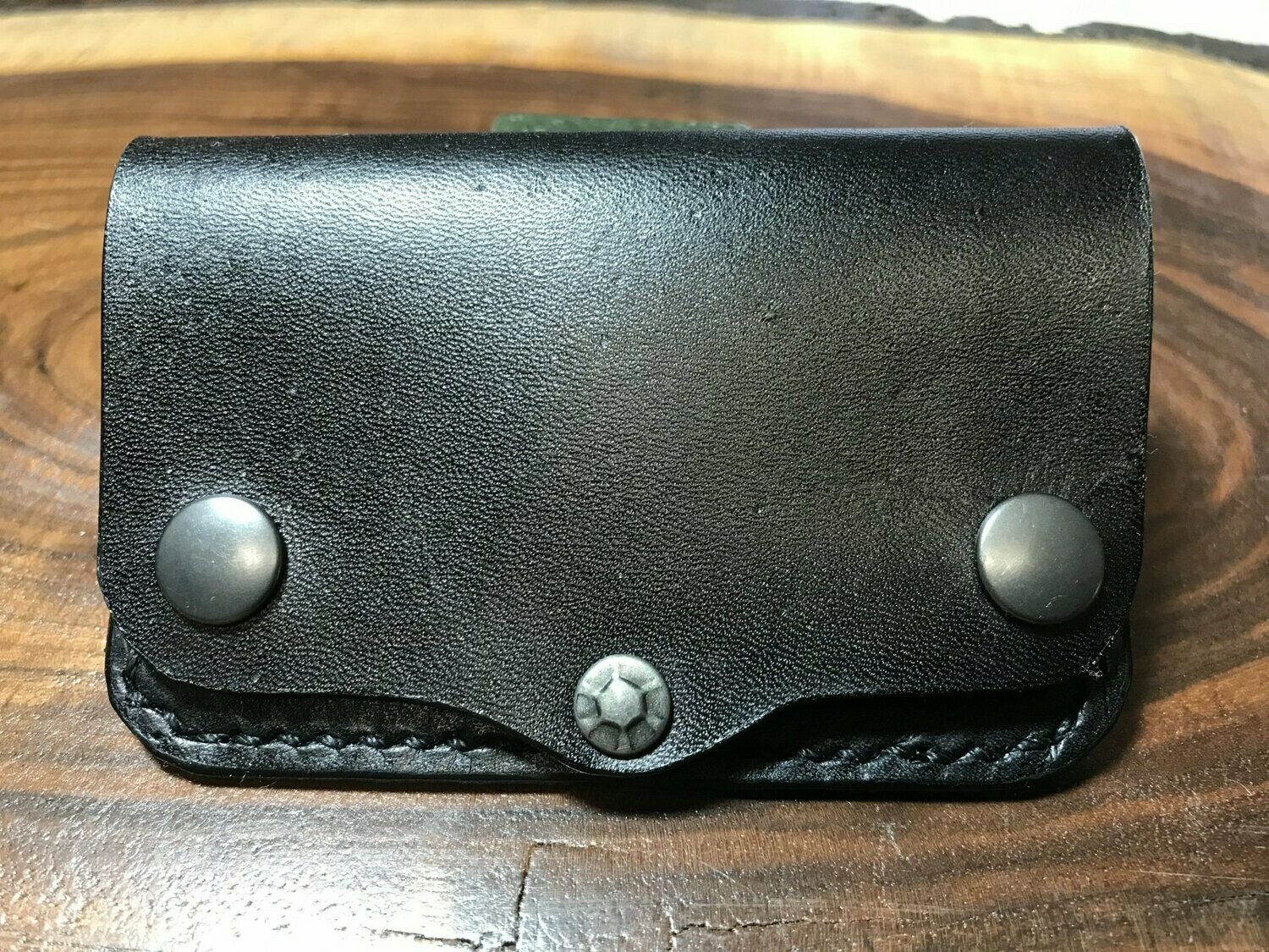 Black business card wallet with rivets