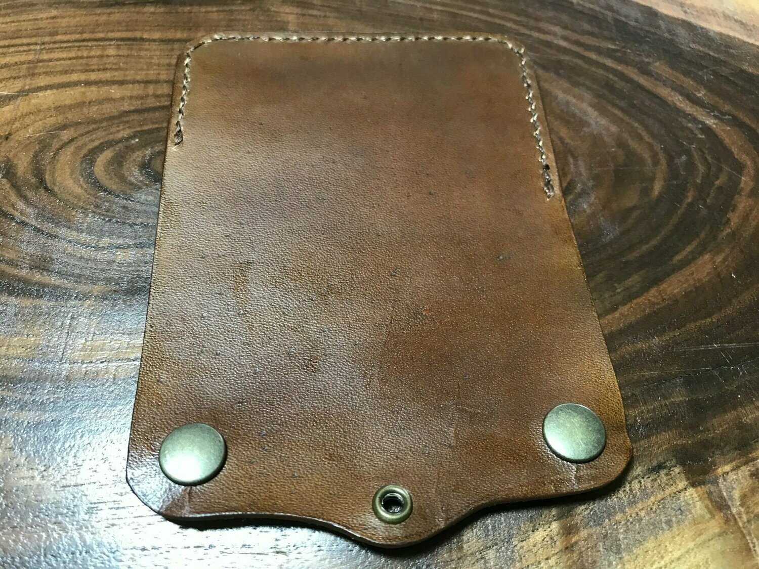 Brown business card wallet with eyelet